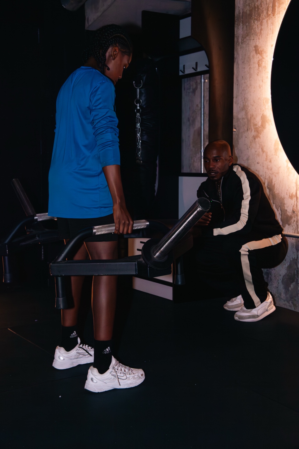 Young athlete receiving supervised physical development coaching