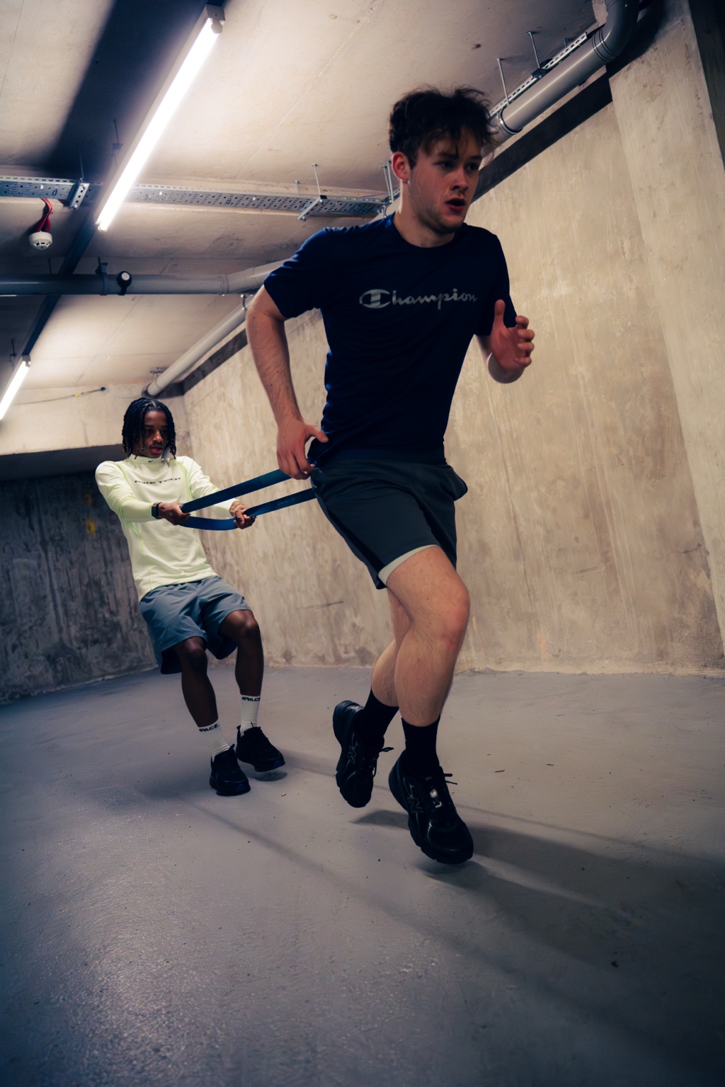 Athlete developing acceleration with resisted sprint training